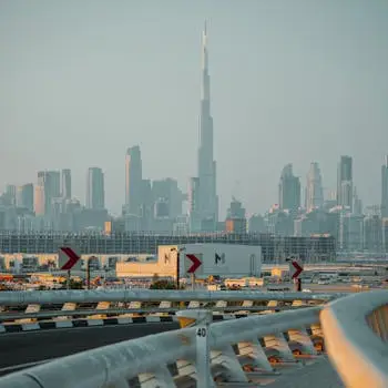 A Complete Cost Breakdown: How Much Does It Really Cost to Start a Business in Dubai? Scenic cityscape of Dubai featuring the Burj Khalifa towering over the skyline at daytime.